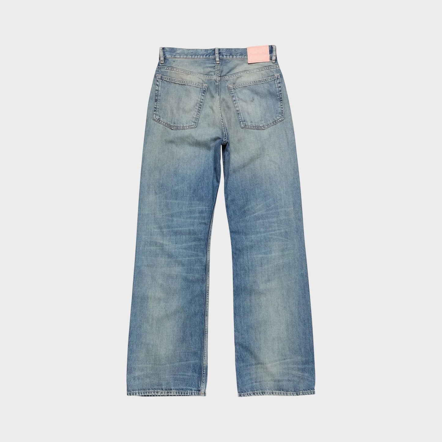 Tasoni mid blue cotton mid waist flare leg denim jeans with pink logo patch.