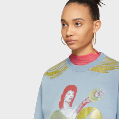 Tasoni light blue cotton knit crewneck sweatshirt with a David Bowie graphic print and gold brushstroke details.
