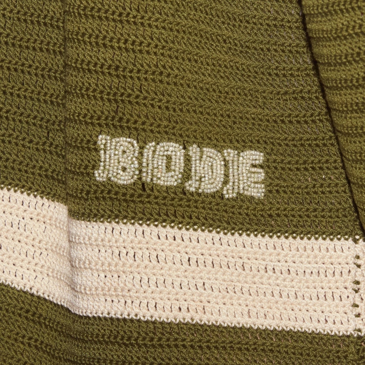 Tasoni Bode Marsh Crochet Long Sleeve Shirt in green and cream with beaded logo detail.