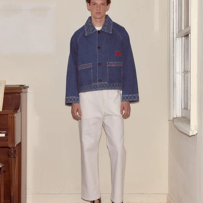 Tasoni Bode Jacket, indigo denim with geometric embroidery on pockets and collar, white contrast stitching.