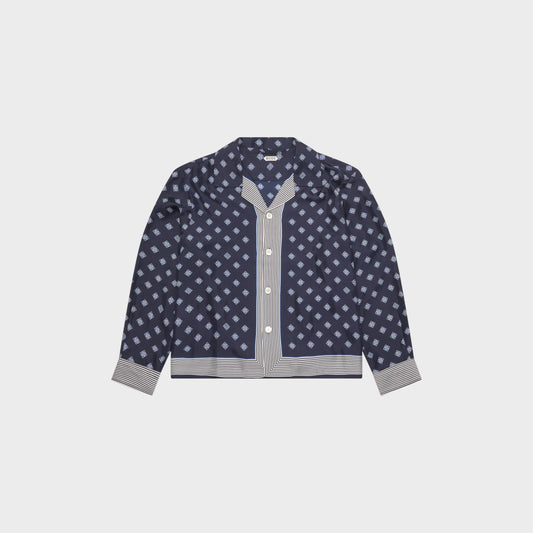 Tasoni Bode long sleeve shirt in navy blue with a diamond pattern and striped trim. Features a camp collar and button front.