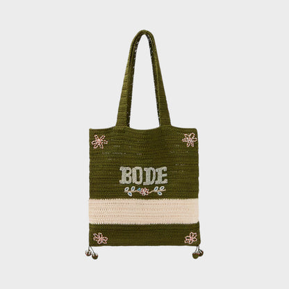 Tasoni Bode Marsh green crochet tote bag with beaded floral accents and "BODE" lettering.