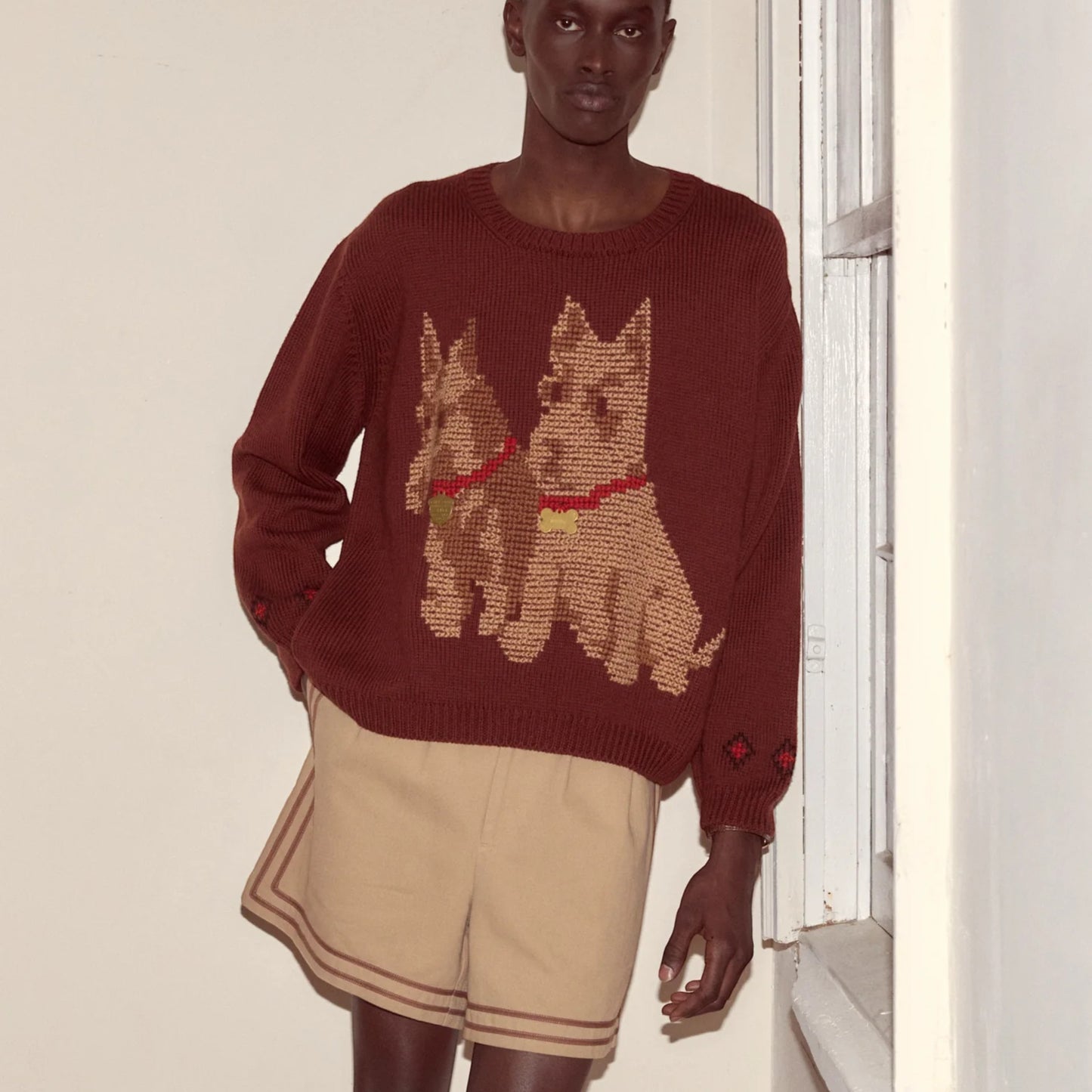 Tasoni Bode Scottie Wool Sweater in brown with a knit Scottie dog intarsia design and red collar detail.