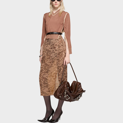 Tasoni bronze brown lace midi skirt with a back slit, layered over a slip.