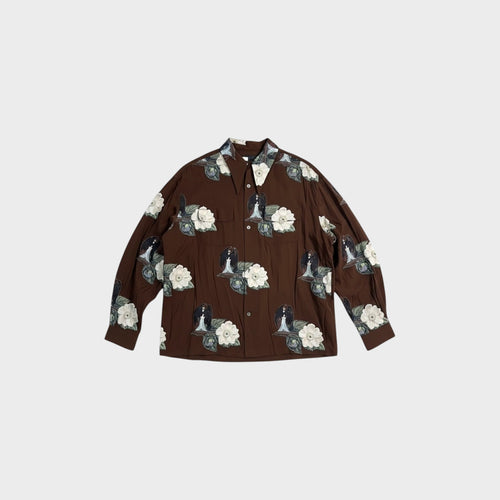 Tasoni brown long-sleeve shirt with all-over print of white flowers and figures.