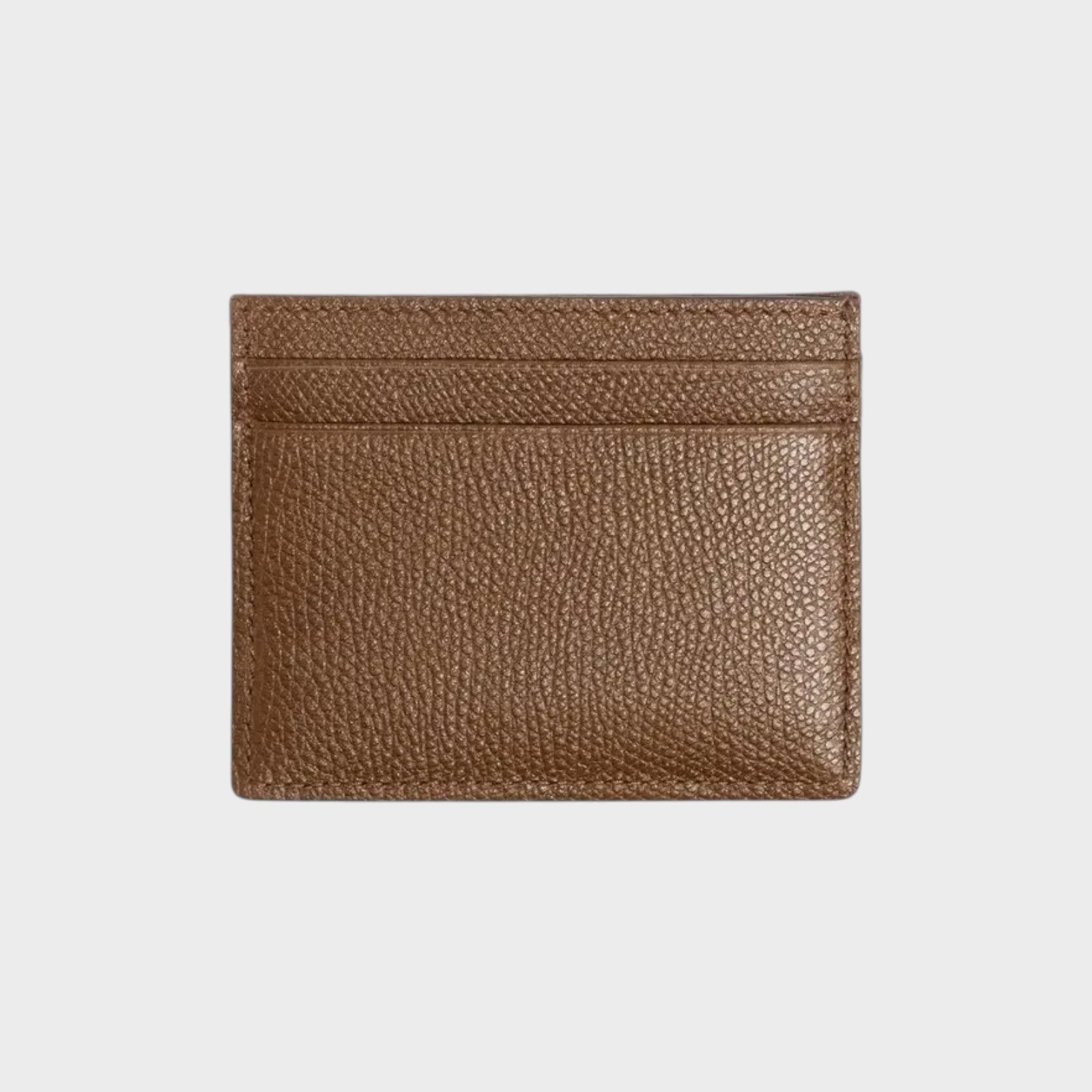 Tasoni brown pebbled leather card holder with multiple card slots.