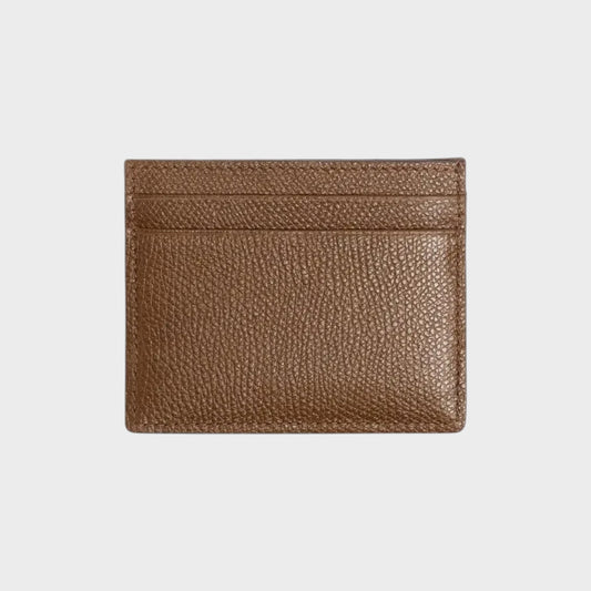 Tasoni brown pebbled leather card holder with multiple card slots.