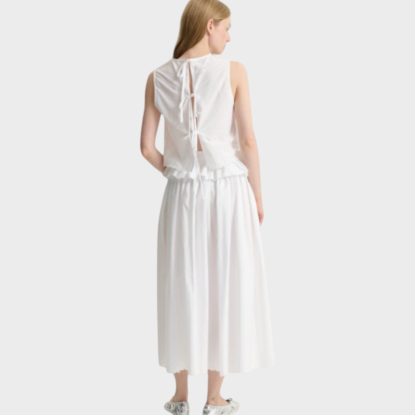 Tasoni Cecilie Bahnsen white broderie anglaise midi skirt with elasticated, ruffled waist and tie back top.