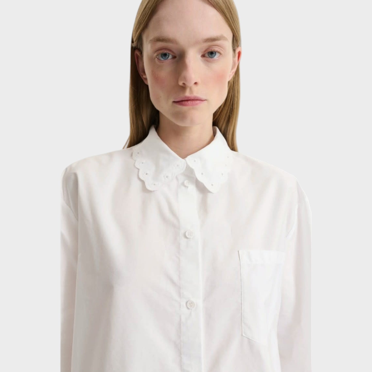 Tasoni Cecilie Bahnsen white broderie anglaise shirt with a scalloped collar and pocket detail.
