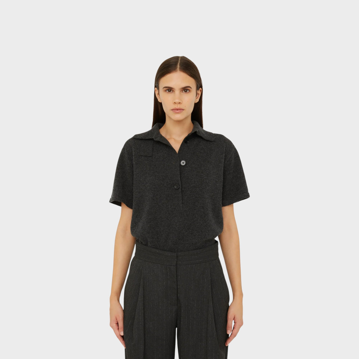 Tasoni Christopher Esber charcoal grey cashmere short sleeve polo shirt with a classic collar and button placket.