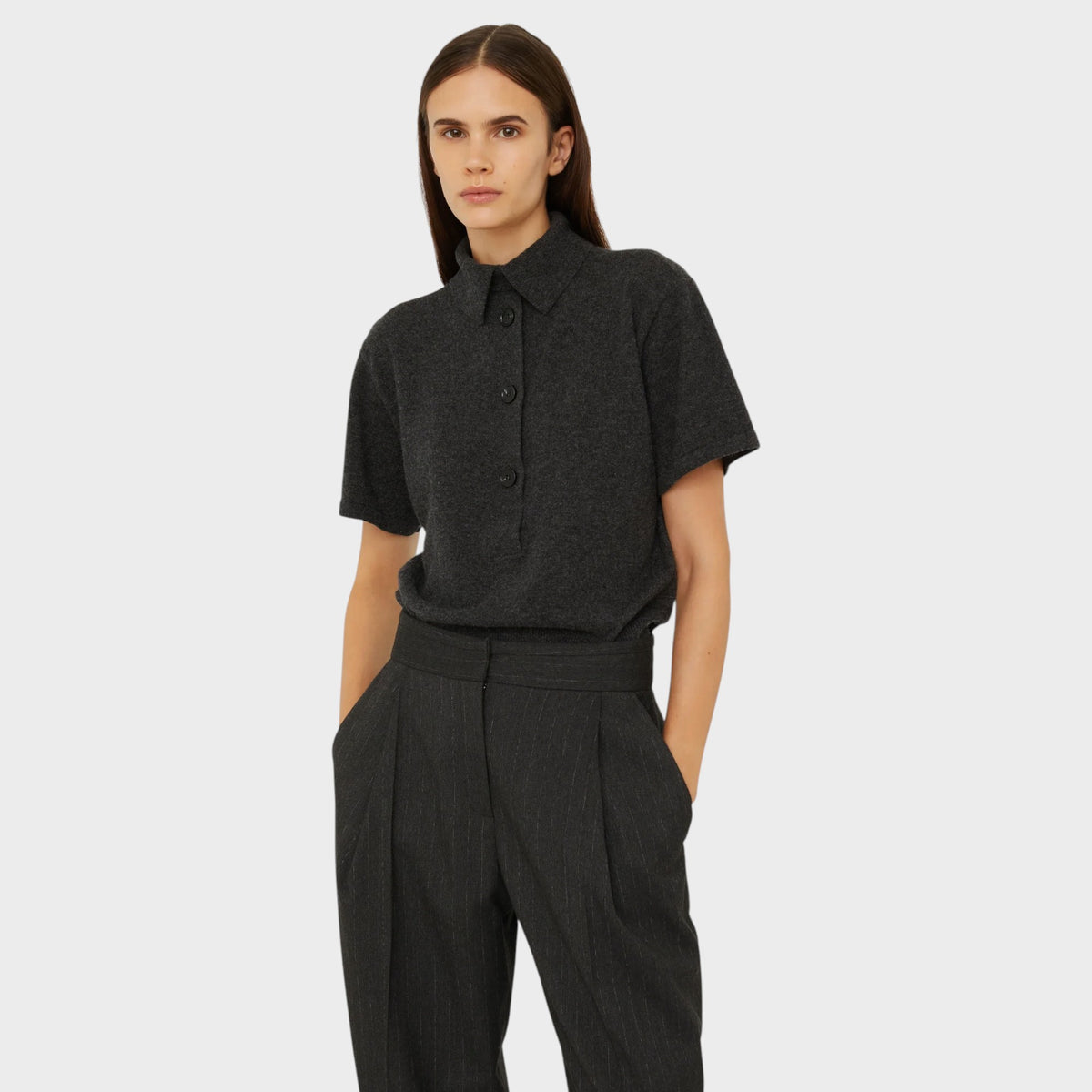 Tasoni Christopher Esber charcoal grey cashmere short sleeve polo shirt with a classic collar and button placket.
