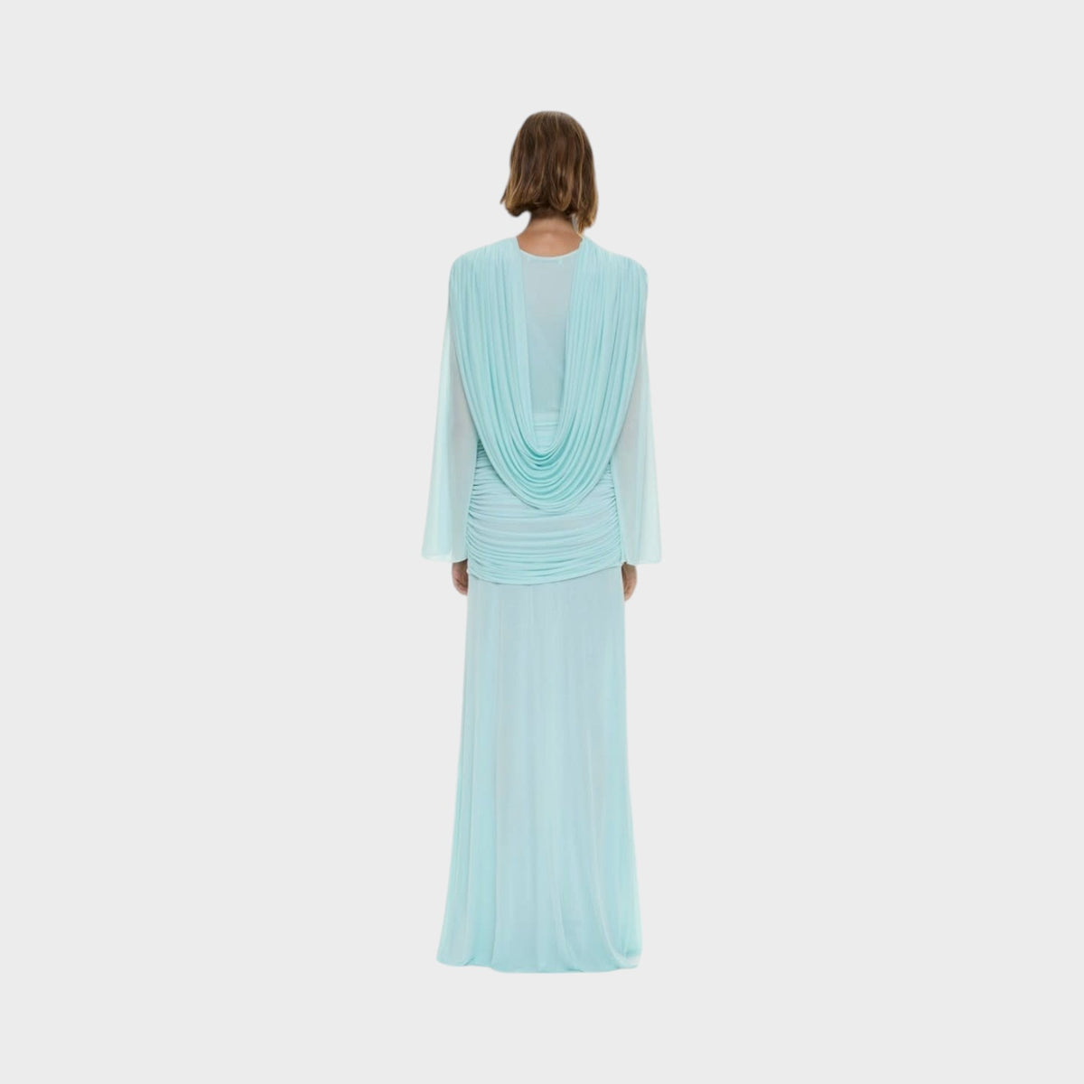 Tasoni Christopher Esber mint green slinky long sleeve gown with draped back detail on a model, back view