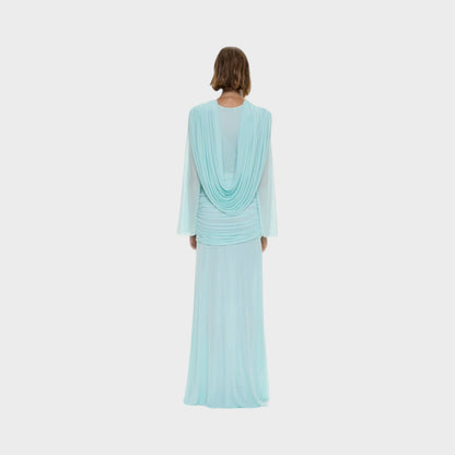 Tasoni Christopher Esber mint green slinky long sleeve gown with draped back detail on a model, back view