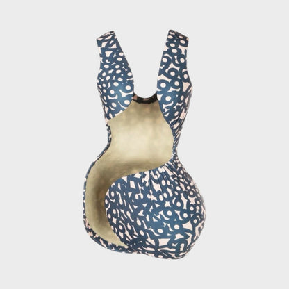 Tasoni Comme des Garcons dress with a dark blue and light pink CDG D-pattern. Sleeveless, open-back design.