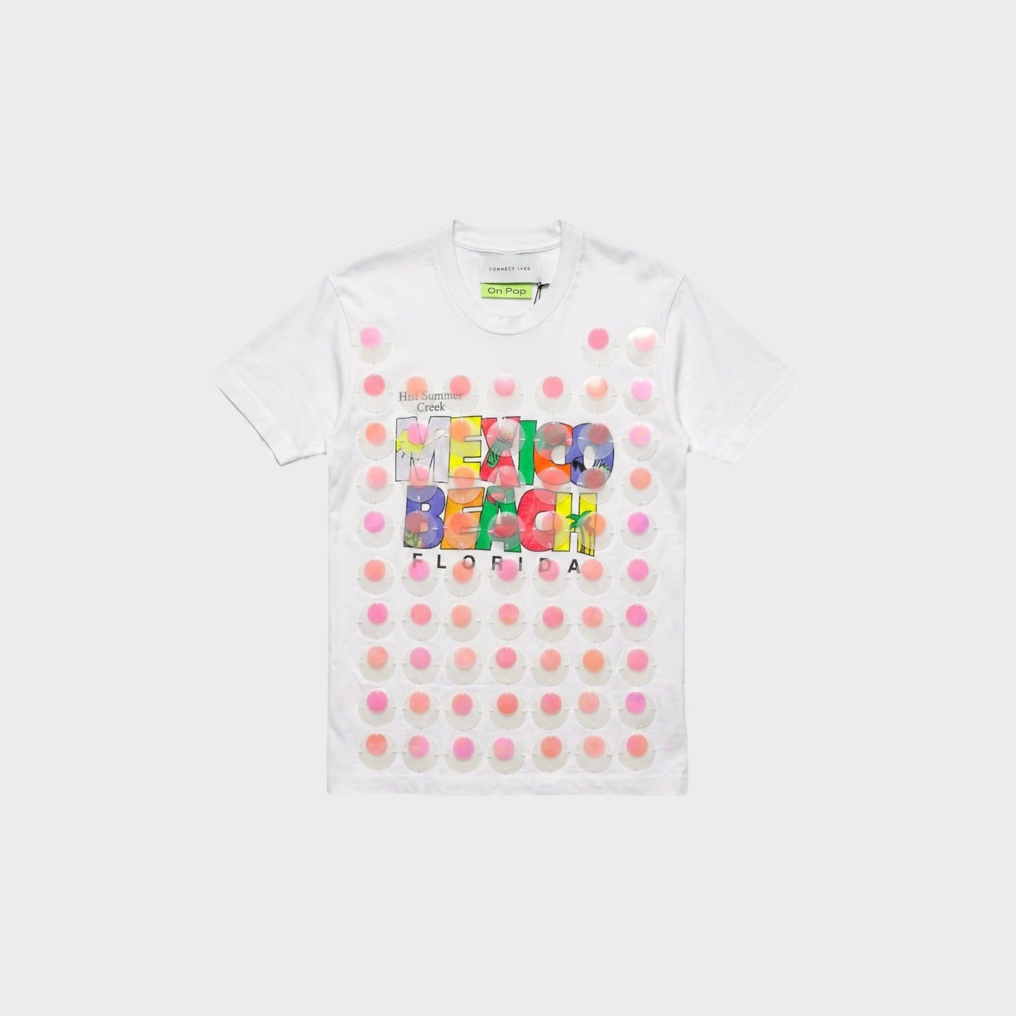 Tasoni white Conner Ives T-shirt featuring Mexico Beach graphic and decorative translucent paillette embellishments.