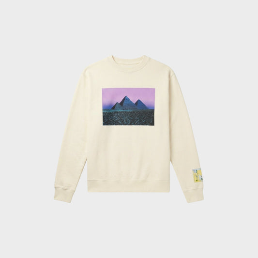 Tasoni cream cotton crew neck sweatshirt with a graphic print of pyramids under a purple sky.