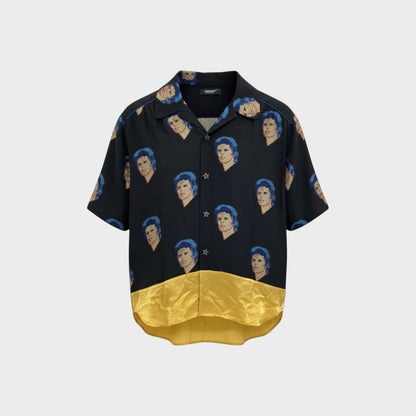 Tasoni black silk blend short sleeve shirt with repeating David Bowie graphic print and gold satin hem.