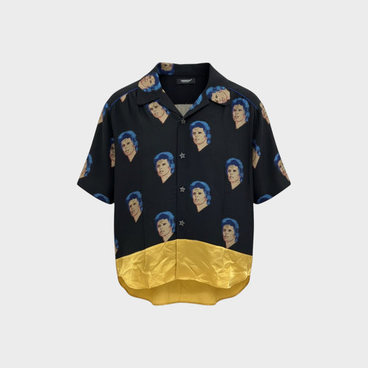 Tasoni black silk blend short sleeve shirt with repeating David Bowie graphic print and gold satin hem.