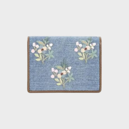Tasoni blue denim wallet with floral embroidery and V-Logo Signature