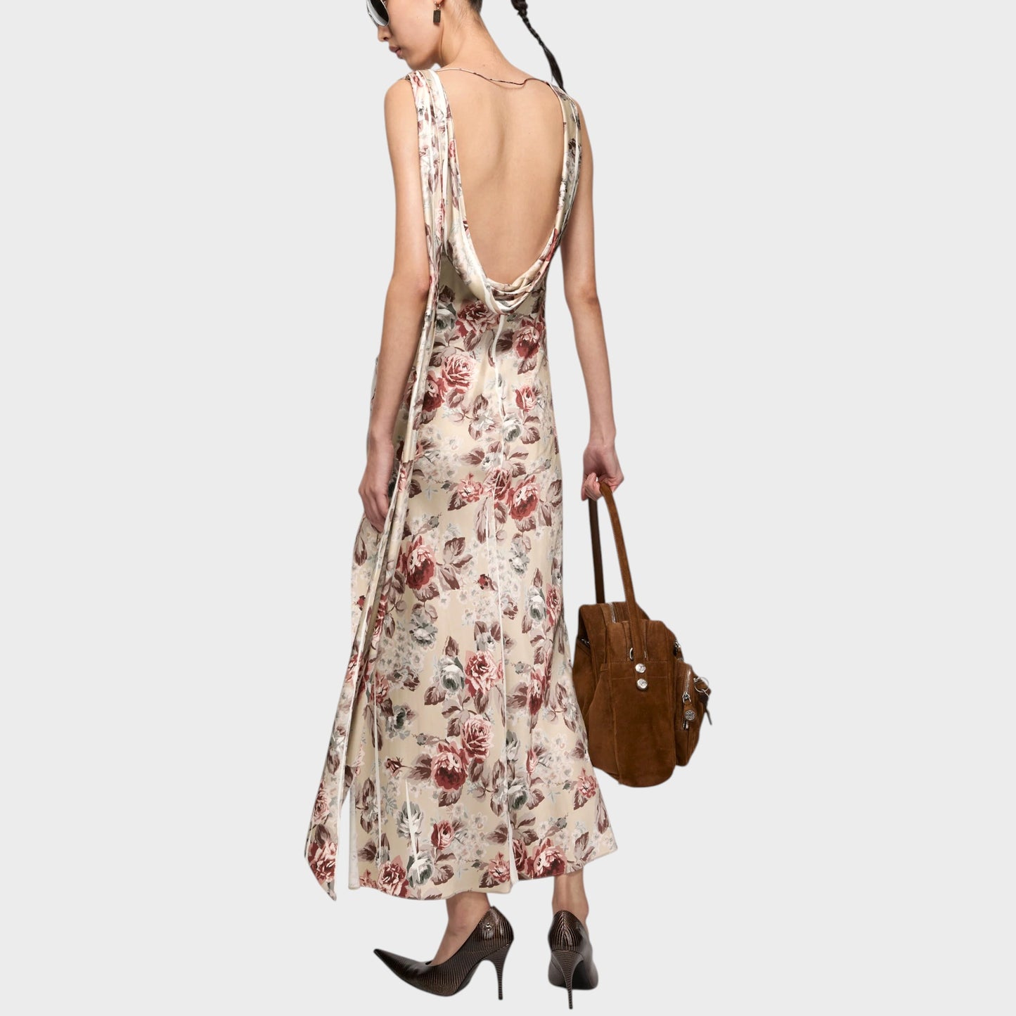 Tasoni beige draped sleeveless long dress with a multi floral print and side slit. Back view.