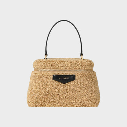 Tasoni Givenchy Antigona bag in natural beige teddy fabric with black leather trim and handle.