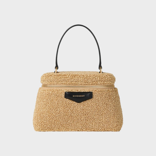 Tasoni Givenchy Antigona bag in natural beige teddy fabric with black leather trim and handle.