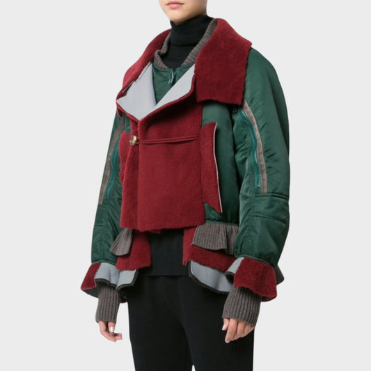 Tasoni green nylon bomber jacket with burgundy shearling inserts, grey ribbed cuffs, and panelled details.