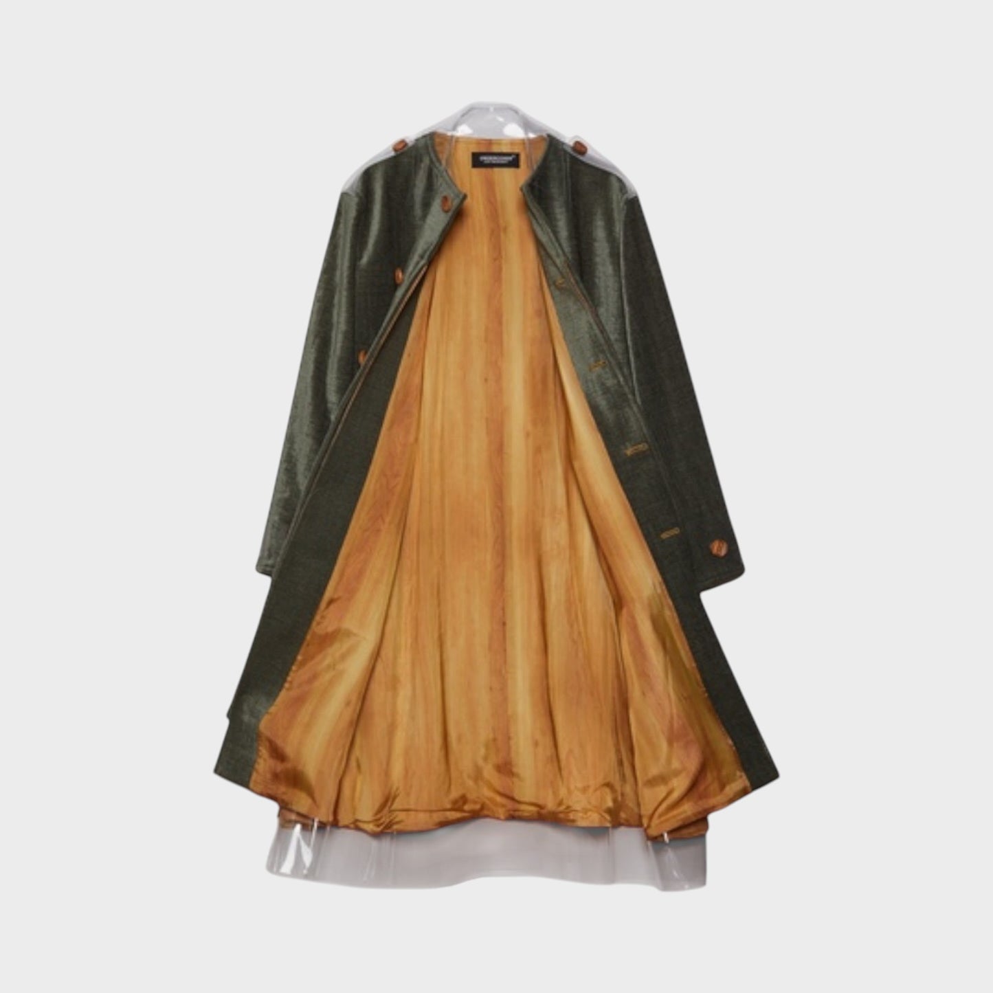Tasoni moss green button-up coat with a contrasting golden lining and transparent collar and hem details.