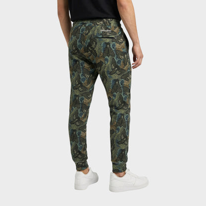 Tasoni men's green cotton sweatpants with a dark floral and moth print, elastic waist, and zippered back pocket.
