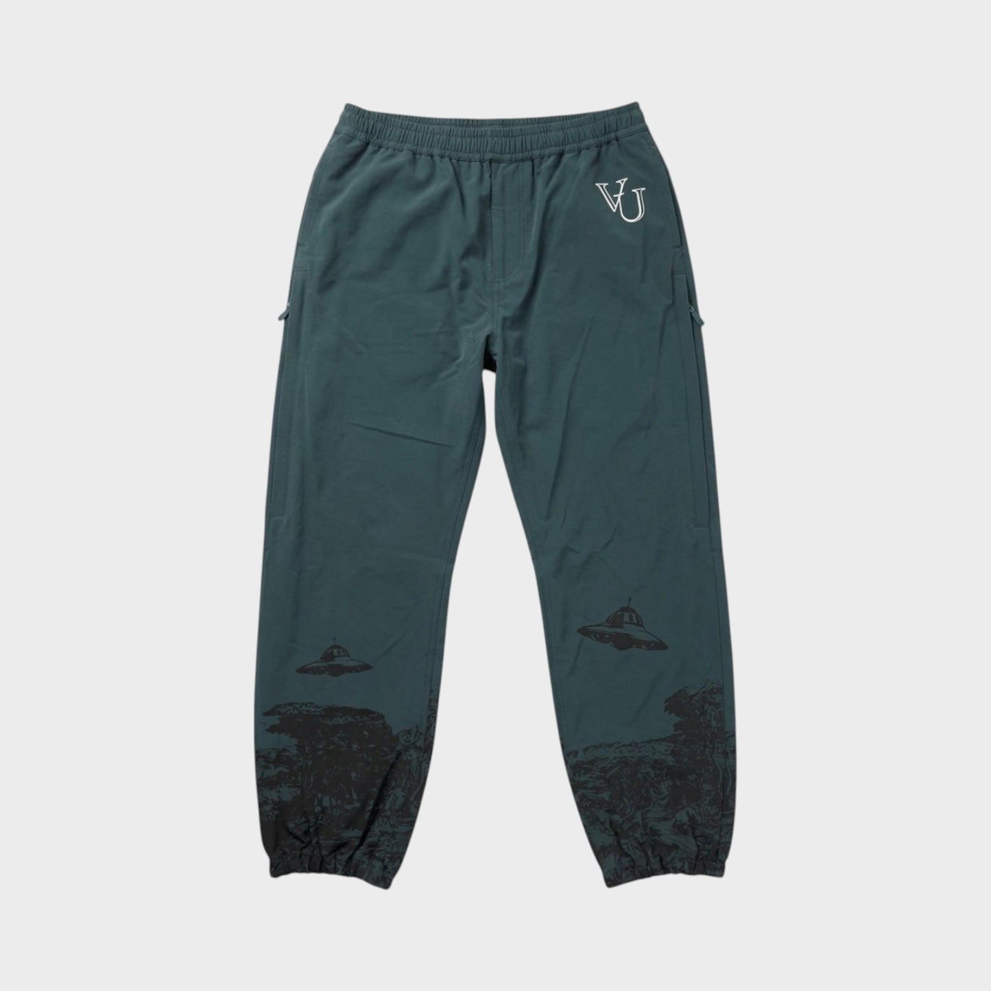 Tasoni green trousers with elastic waist and grey UFO print, featuring a VU logo.