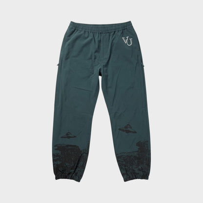 Tasoni green trousers with elastic waist and grey UFO print, featuring a VU logo.