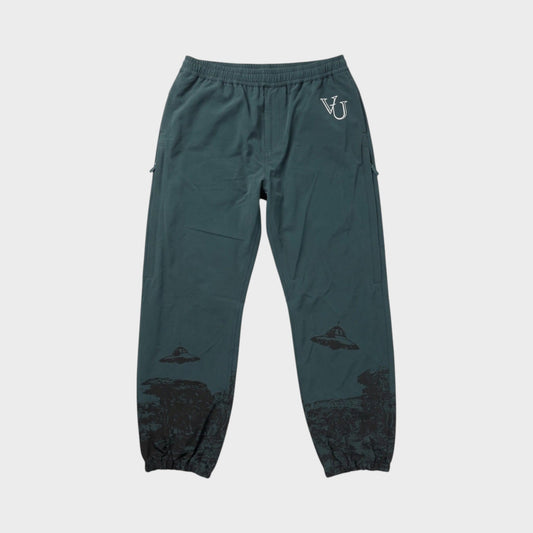 Tasoni green trousers with elastic waist and grey UFO print, featuring a VU logo.