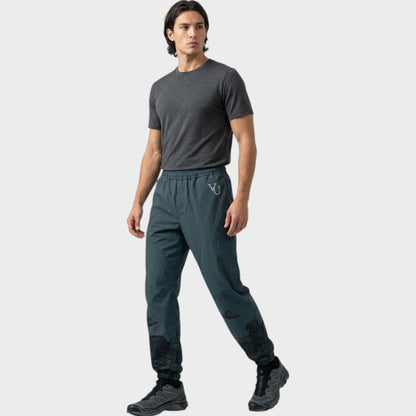 Tasoni men's green elastic waist trousers with grey UFO print and VU logo.