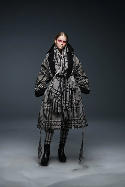 Tasoni grey and black oversized kimono coat with knit print, fringe scarf, and matching plaid leggings.