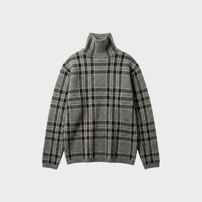 Tasoni grey wool turtleneck sweater with a black and beige plaid pattern. Long sleeves and ribbed cuffs and hem.