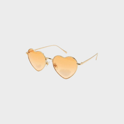 Tasoni gold-frame heart-shaped sunglasses with orange gradient lenses.