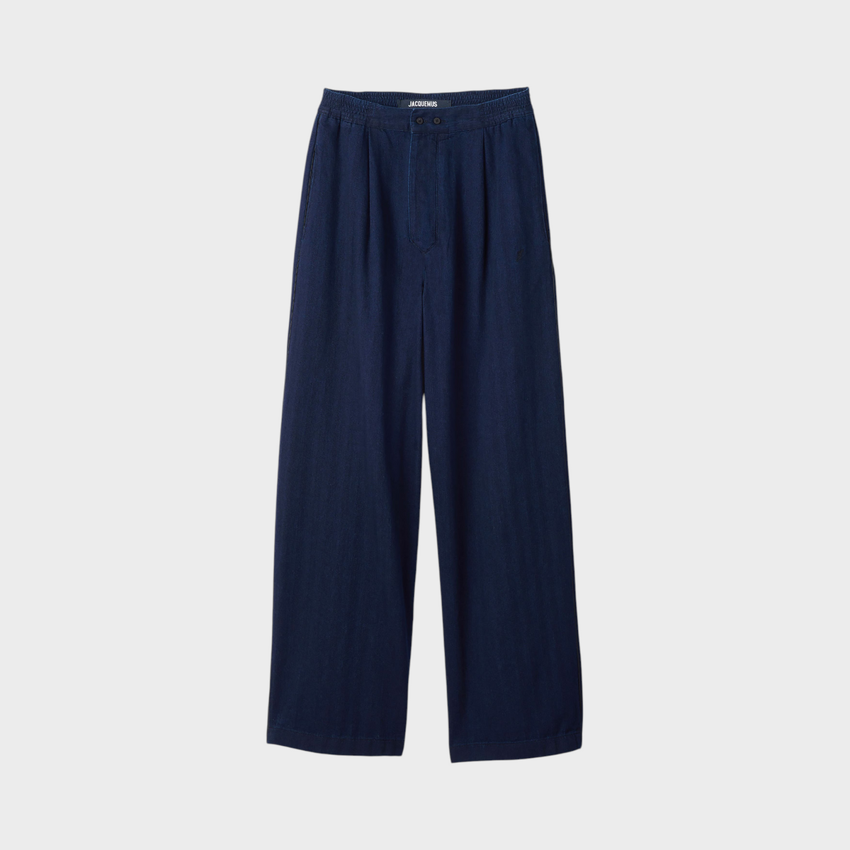 Tasoni Jacquemus Le De-Nimes dark blue fluid denim pajama jeans with a relaxed wide-leg fit and elasticated waist.