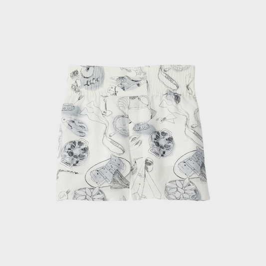 Tasoni Jacquemus Le Boxer Shorts in white featuring a whimsical black and white sketch print with elastic waistband.