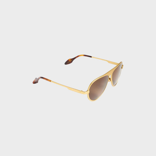 Tasoni JW Anderson Jwa05 gold titanium aviator sunglasses with brown gradient lenses and tortoiseshell temple tips.
