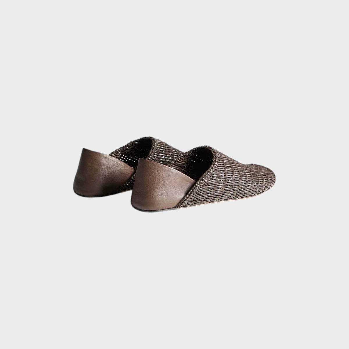 Tasoni JW Anderson brown leather woven slipper mules with a collapsible heel design on a white background.