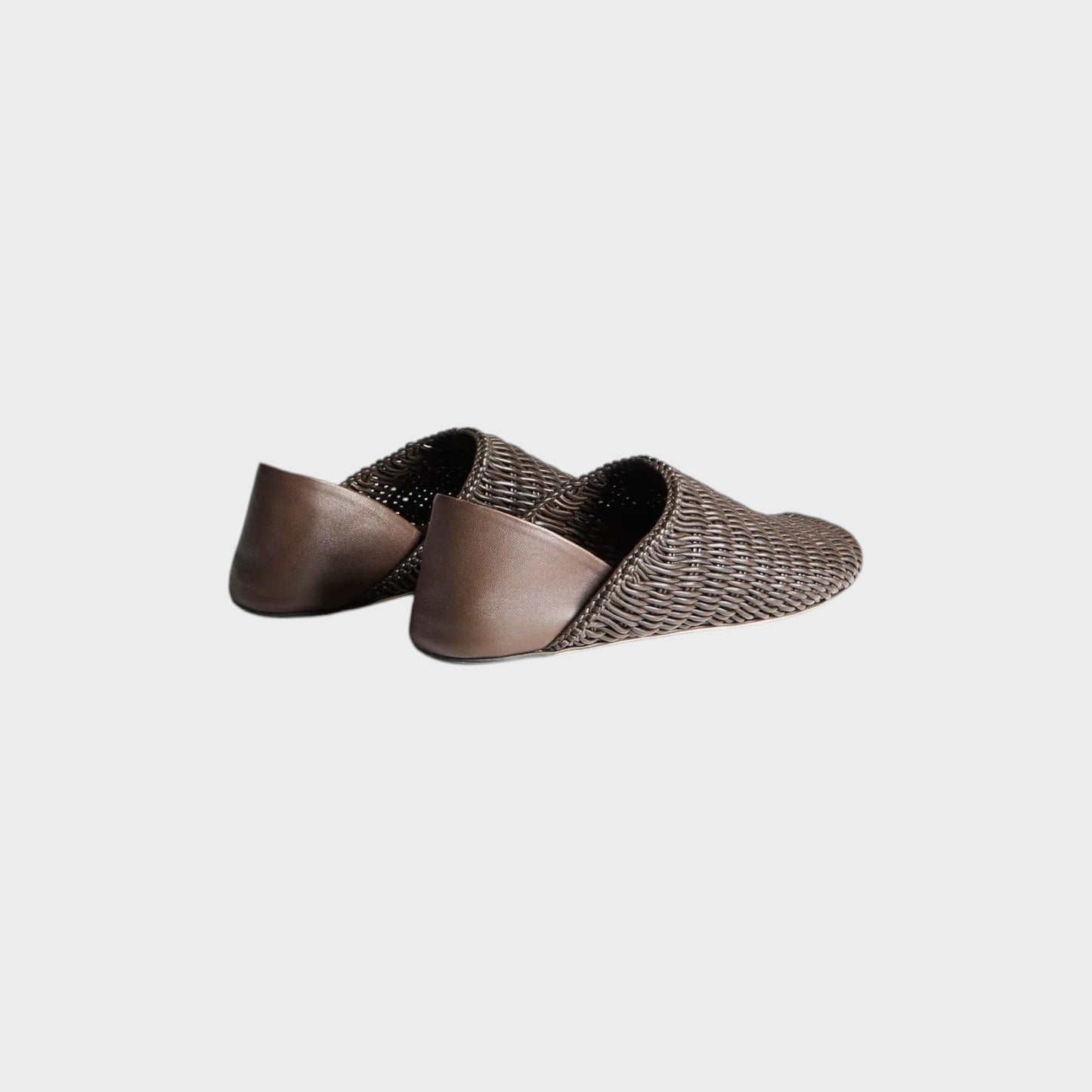 Tasoni JW Anderson brown leather woven slipper mules with a collapsible heel design on a white background.