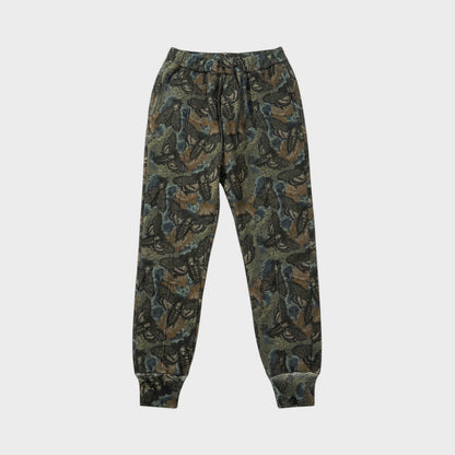 Tasoni khaki base sweatpants with all-over floral and animal print, elastic waist, and cuffed ankles.