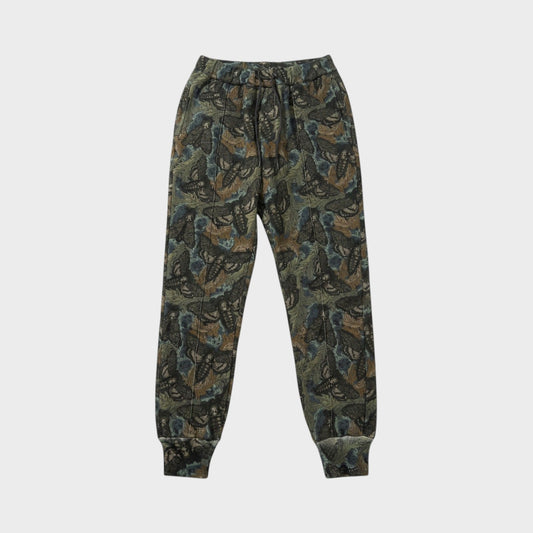 Tasoni khaki base sweatpants with all-over floral and animal print, elastic waist, and cuffed ankles.