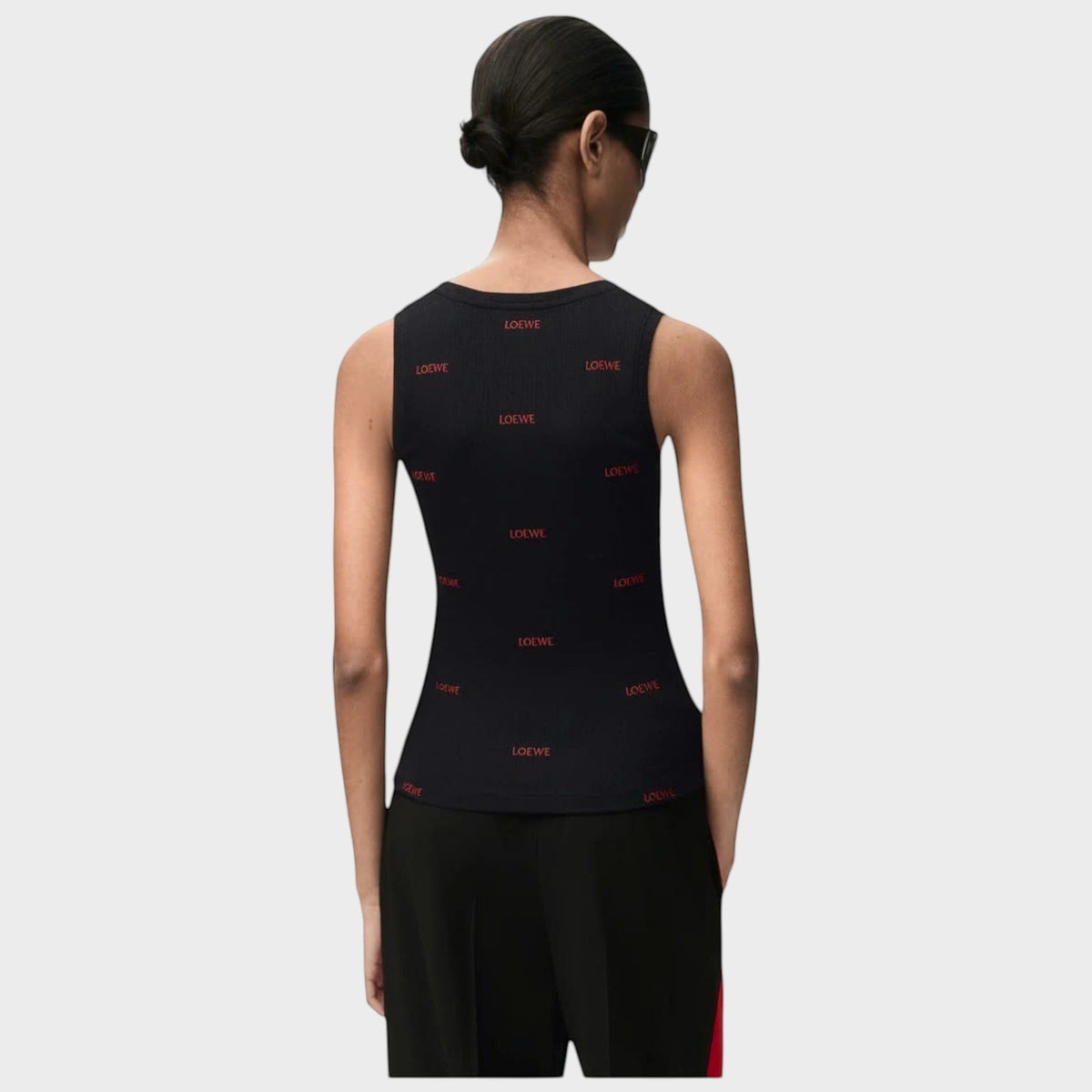 Tasoni Loewe black cotton tank top with red logo print, shown from the back on a model.