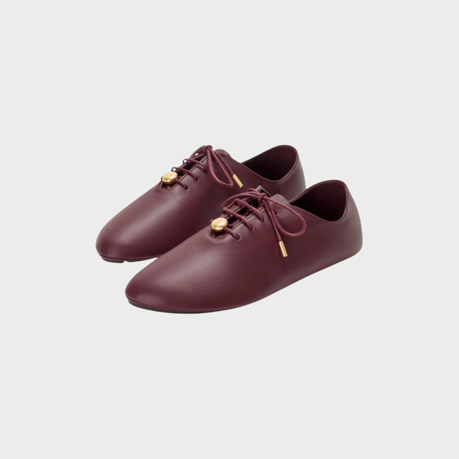 Tasoni Loewe Pebble soft burgundy leather lace-up ballerina flats with gold-tone hardware details.