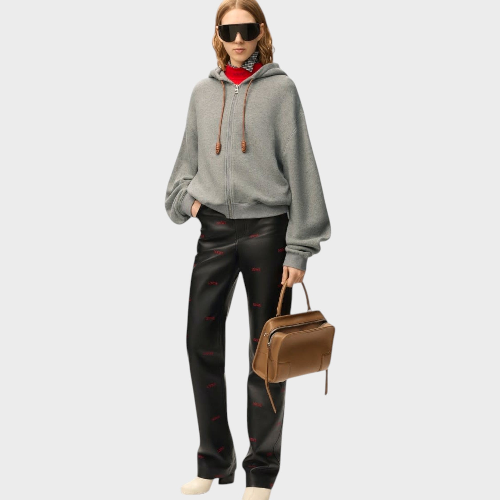 Tasoni Loewe Flamenco grey cashmere zipped hoodie with brown leather details and a red undershirt.