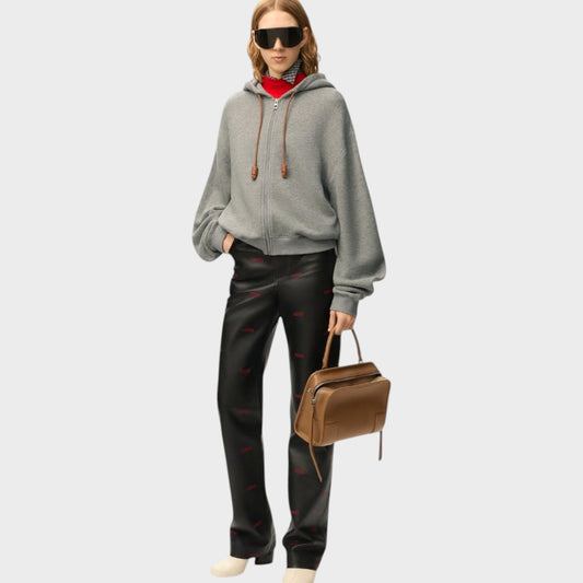 Tasoni Loewe Flamenco grey cashmere zipped hoodie with brown leather details and a red undershirt.