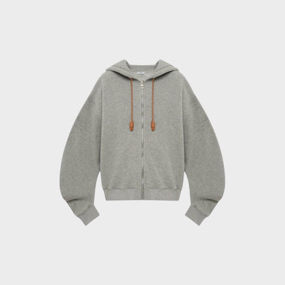 Tasoni Loewe Flamenco grey cashmere zipped hoodie with balloon sleeves and leather drawstring details.