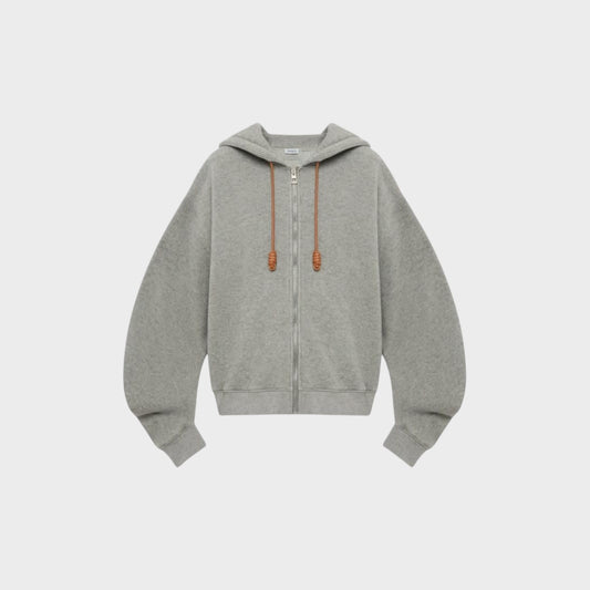 Tasoni Loewe Flamenco grey cashmere zipped hoodie with balloon sleeves and leather drawstring details.
