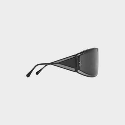 Tasoni Loewe metal shield shaped sunglasses with dark grey lenses and black frames featuring geometric accents.
